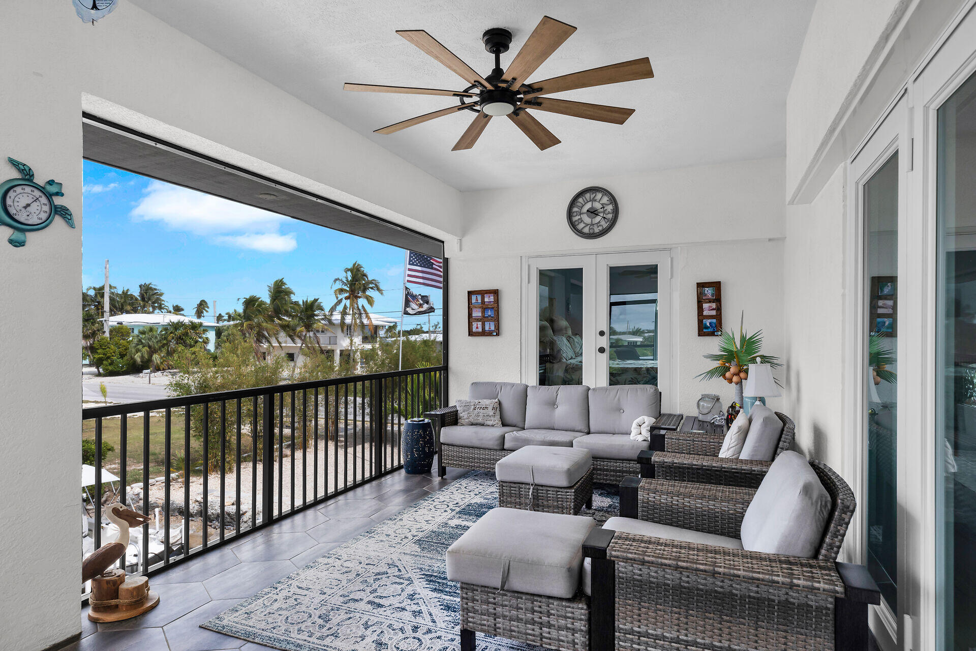 30363 Flamingo Lane Big Pine Key, FL 33043 - Photo 20 of 43 a living room with furniture tv and a large window
