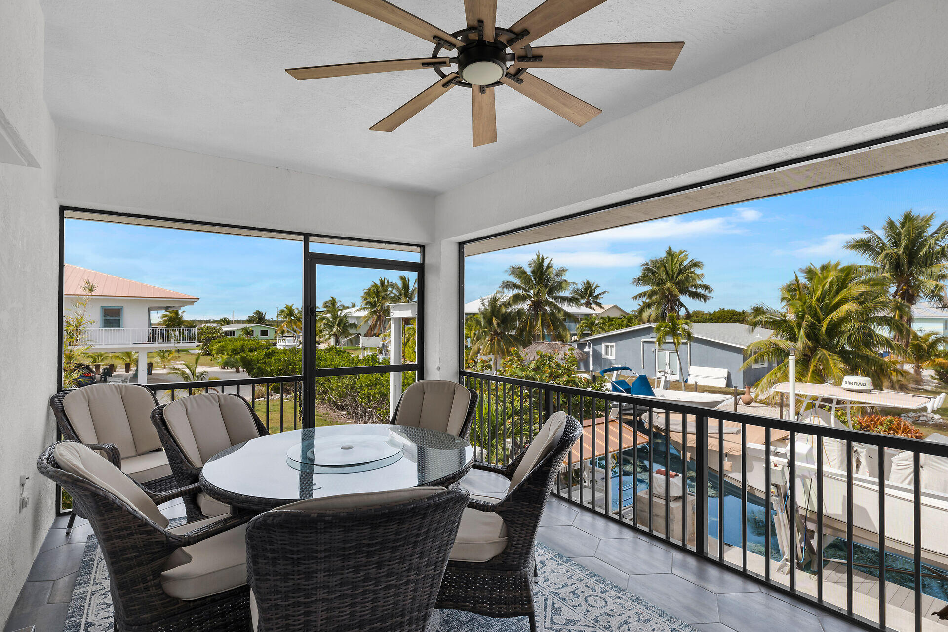 30363 Flamingo Lane Big Pine Key, FL 33043 - Photo 21 of 43 a view of a dining room with furniture window and outside view