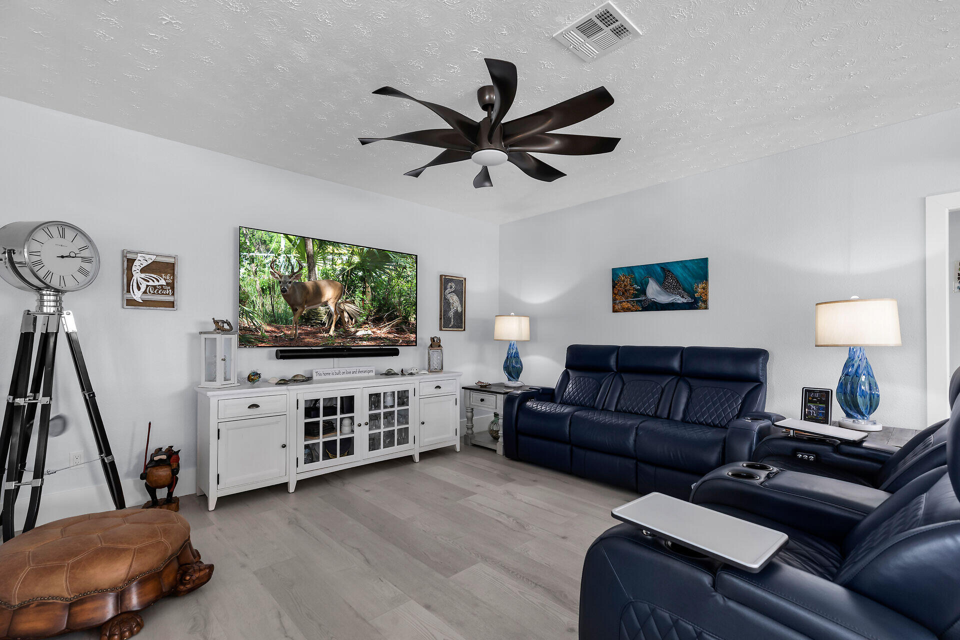 30363 Flamingo Lane Big Pine Key, FL 33043 - Photo 23 of 43 a living room with furniture and a flat screen tv