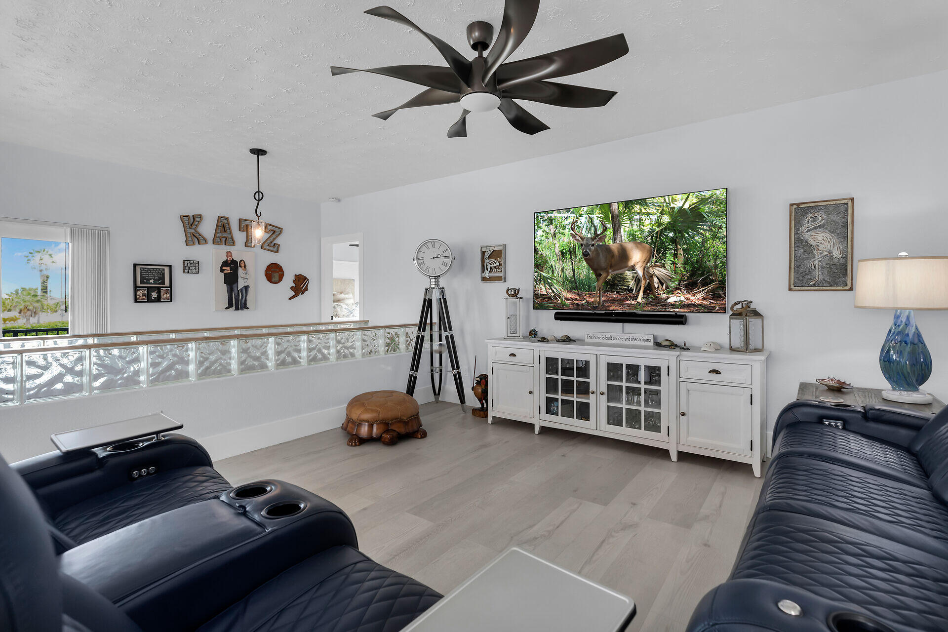 30363 Flamingo Lane Big Pine Key, FL 33043 - Photo 24 of 43 a bedroom with furniture and a flat screen tv