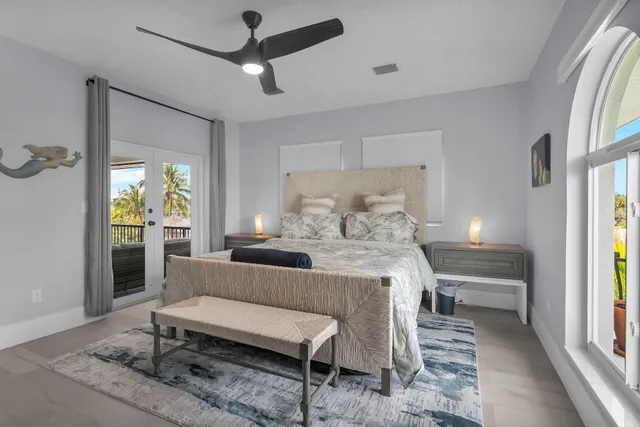 a bathroom with a sink a tub and a mirror