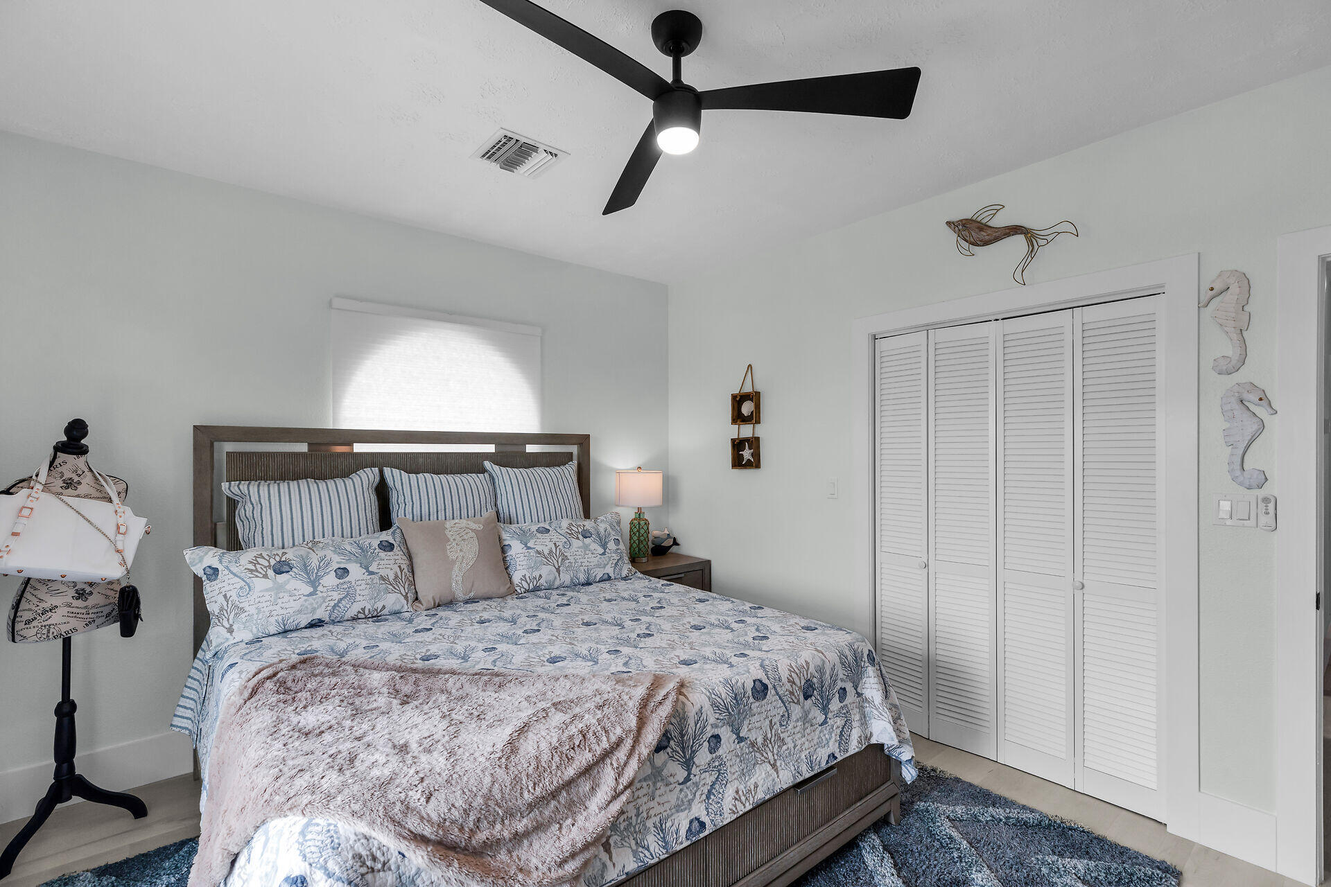 30363 Flamingo Lane Big Pine Key, FL 33043 - Photo 29 of 43 a bedroom with a bed and a window