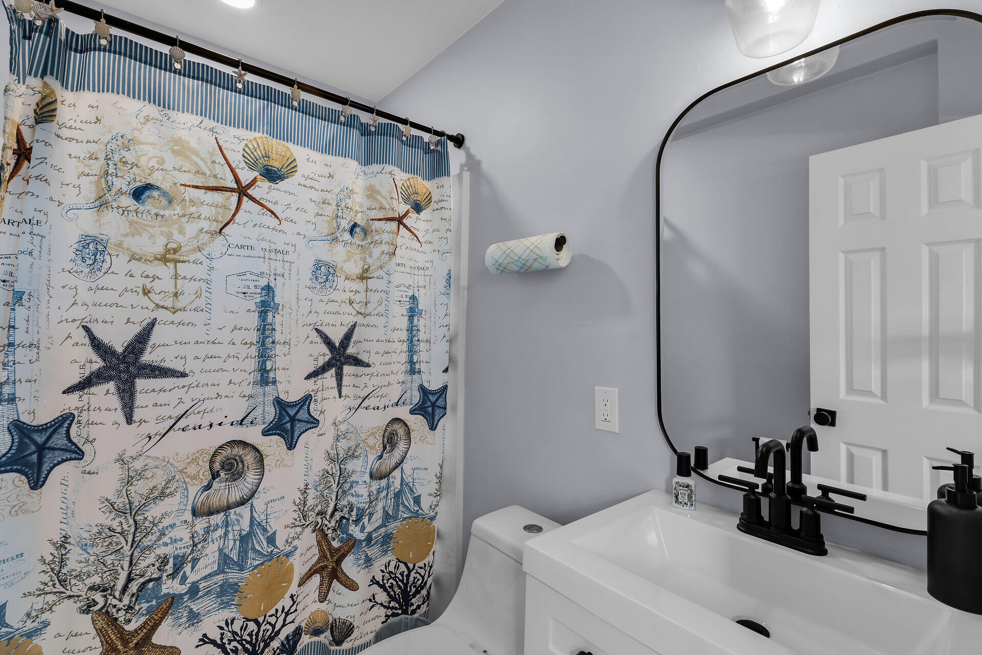 30363 Flamingo Lane Big Pine Key, FL 33043 - Photo 38 of 43 a bathroom with a sink and mirror