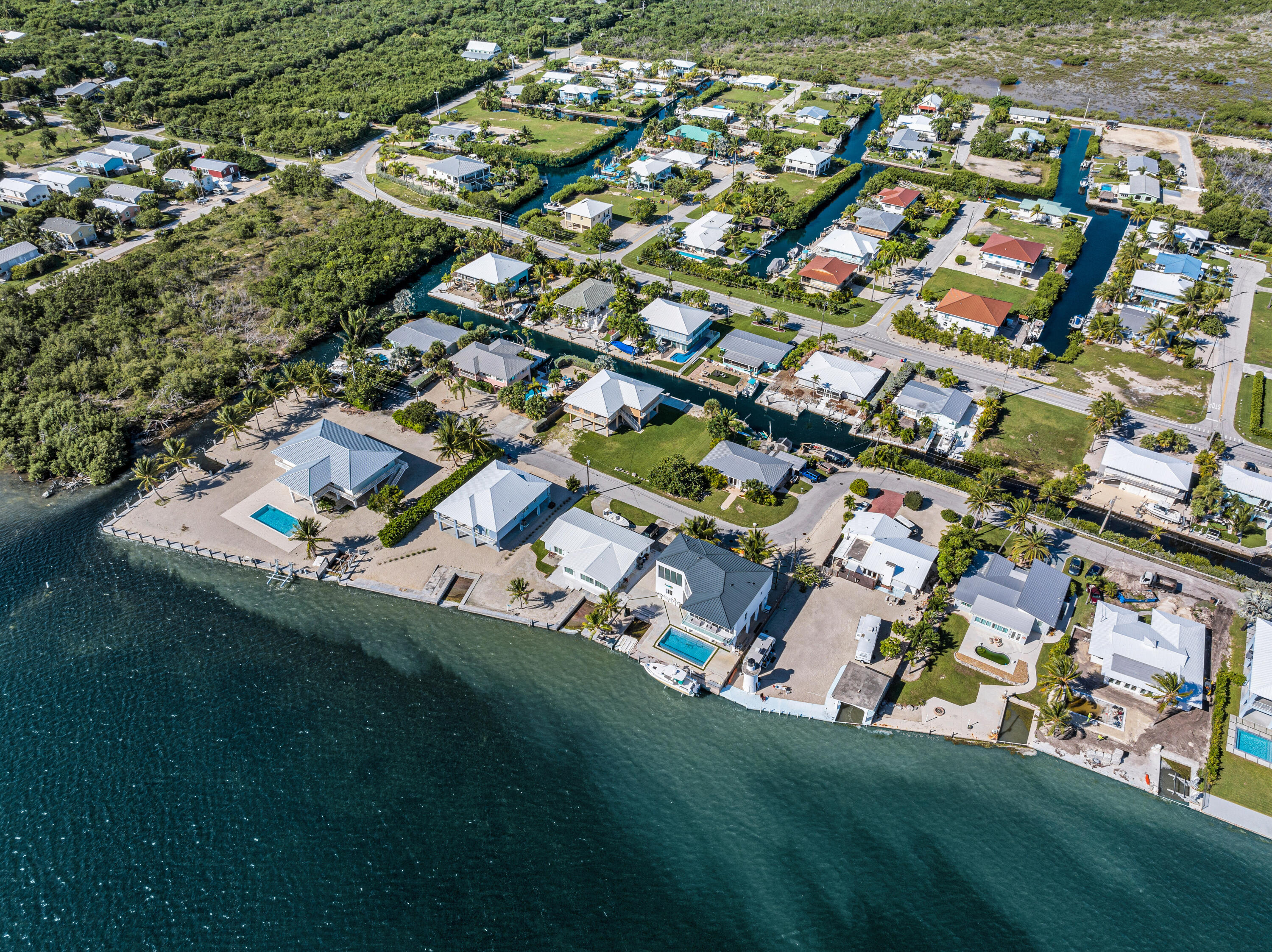30363 Flamingo Lane Big Pine Key, FL 33043 - Photo 43 of 43 an aerial view of residential houses with outdoor space and trees