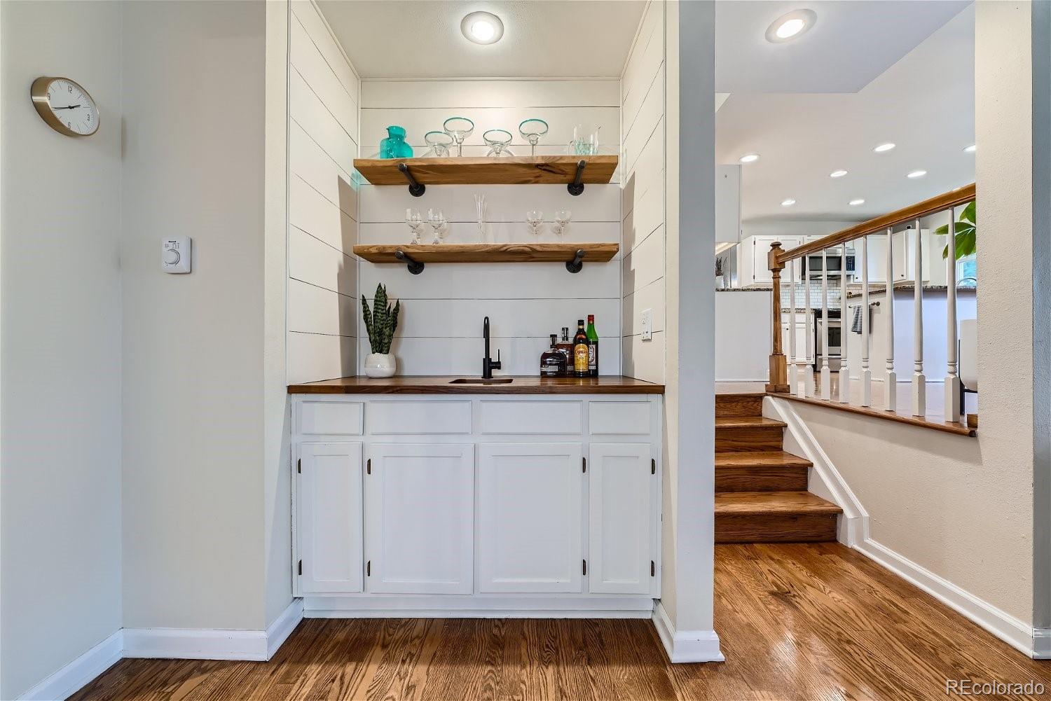 16671 East Prentice Circle Centennial, CO 80015 - Photo 17 of 40 a view of entryway and hall with wooden floor