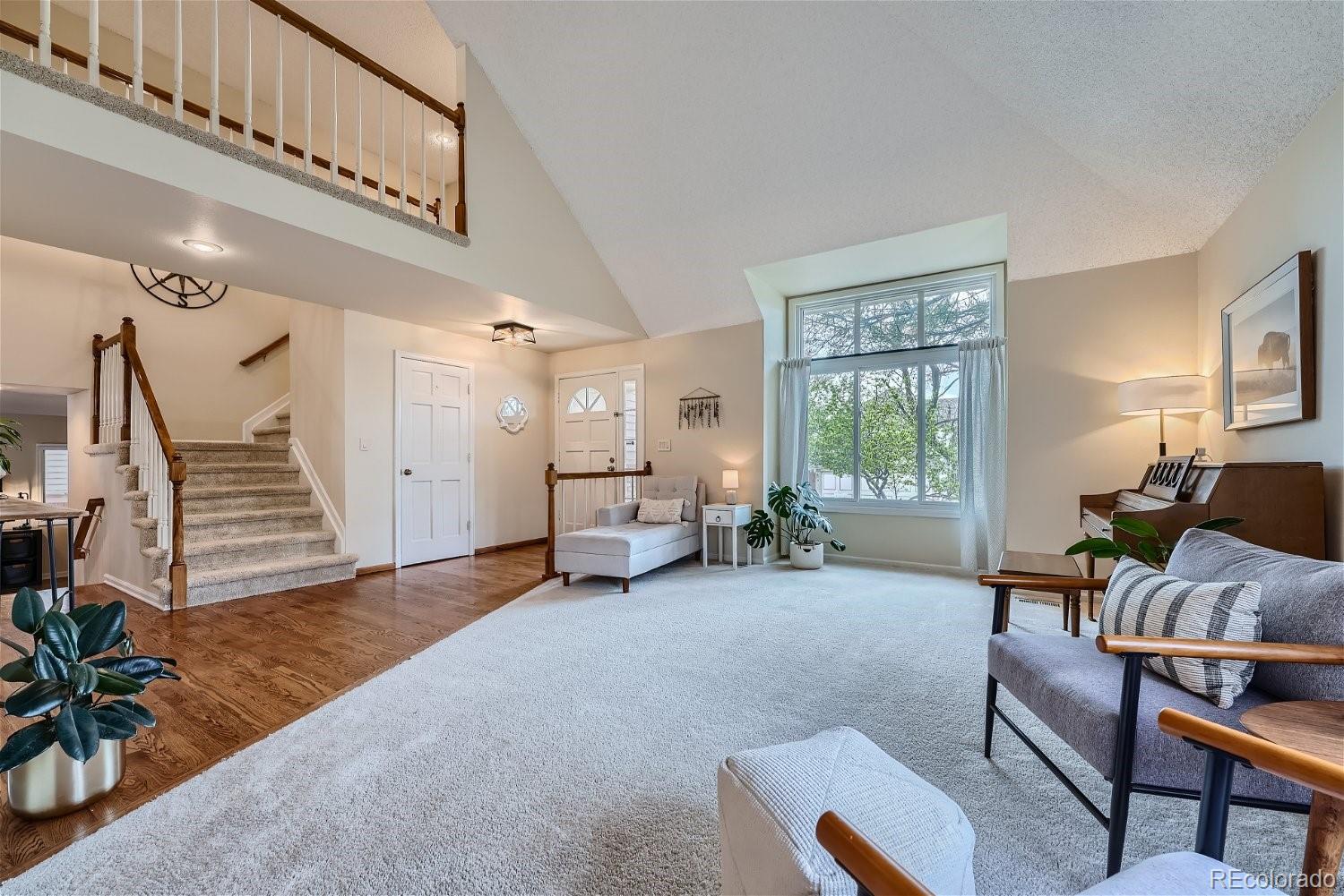 16671 East Prentice Circle Centennial, CO 80015 - Photo 6 of 40 a living room with furniture and a window
