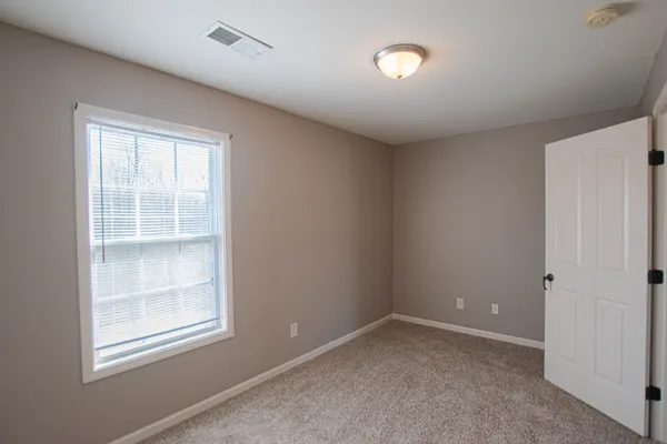 an empty room with a window