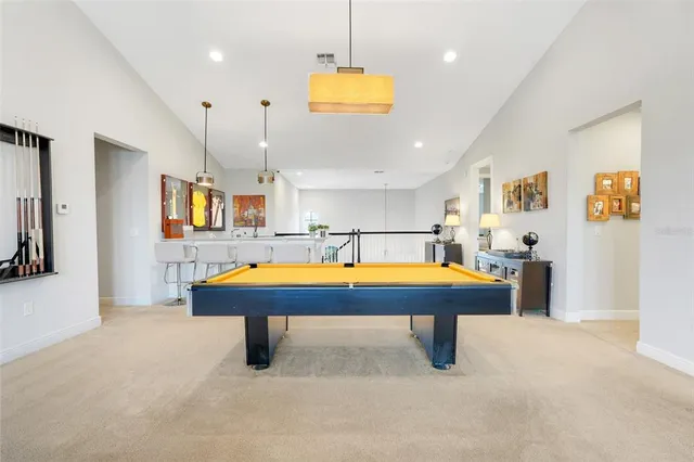 a bedroom with furniture and flat screen tv