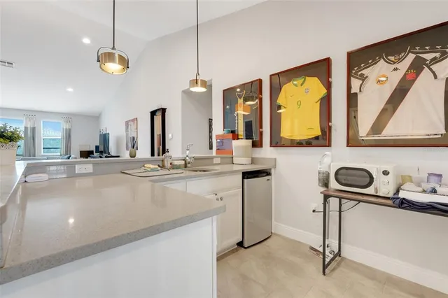 a bathroom with a toilet a sink and a mirror