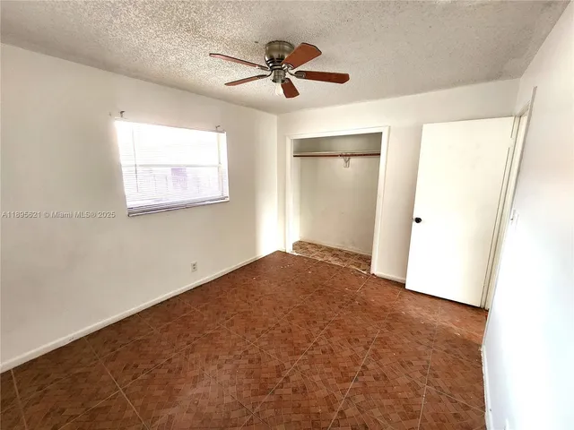 a view of a balcony with seating space