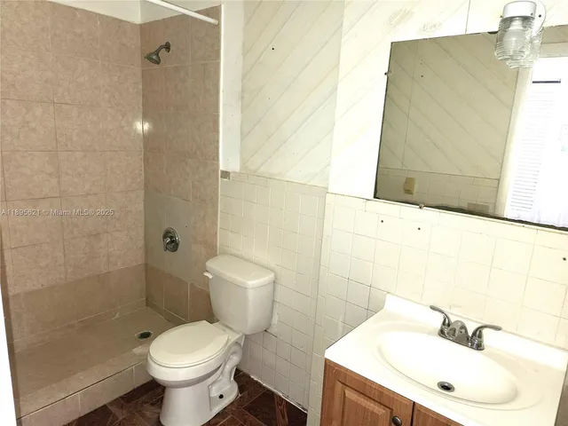 a view of a house with backyard porch and patio