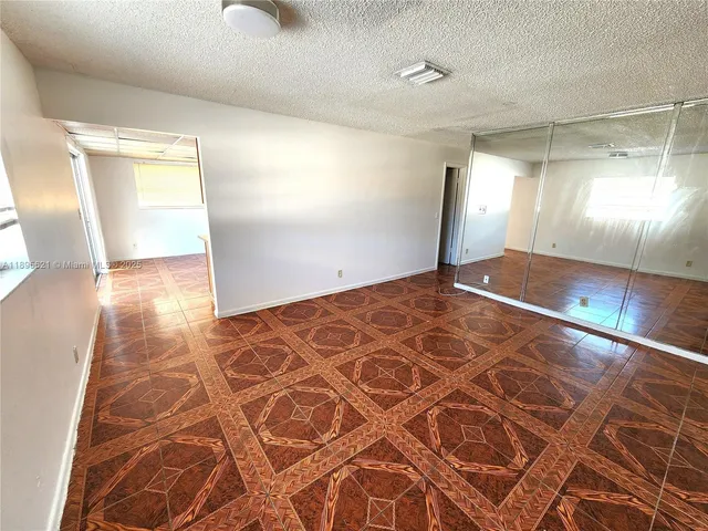 a bedroom with a bed and a table