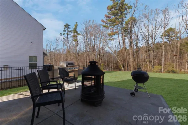 a view of a tables and chairs in the patio