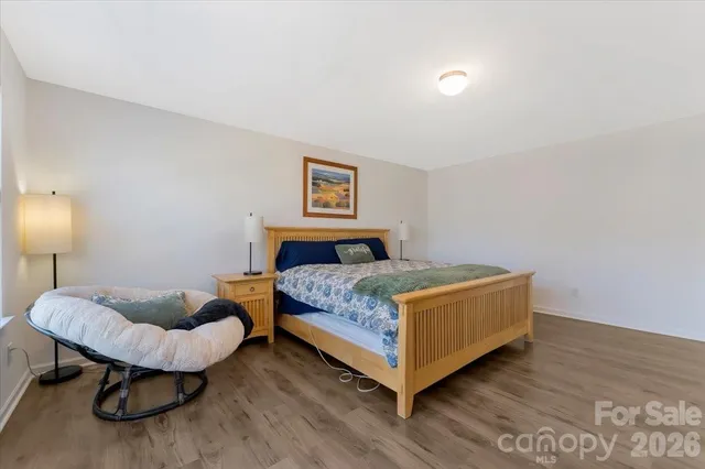 a bathroom with a double vanity sink mirror double shower and a toilet