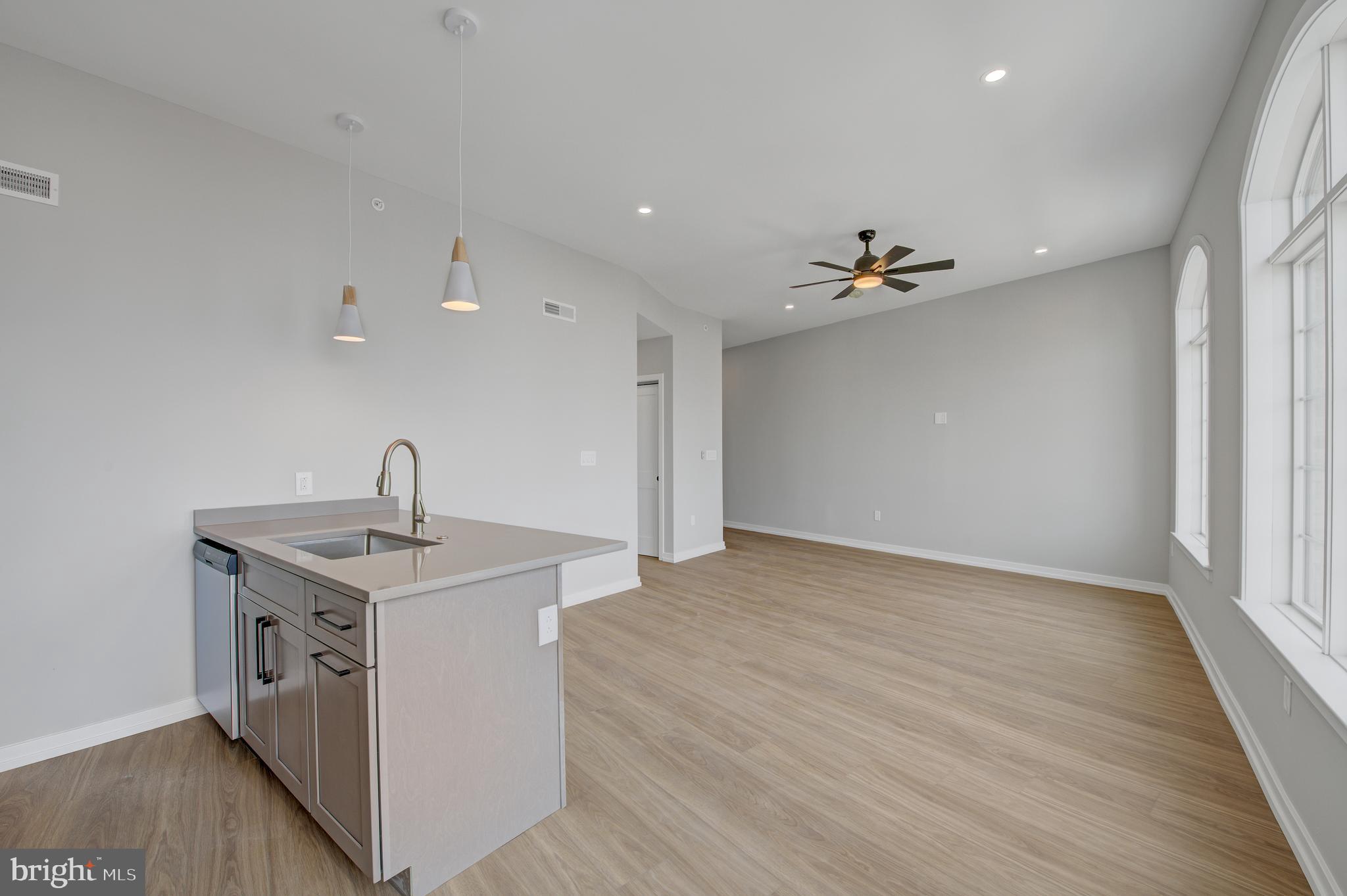2445 Innovator Way, Unit 3A Philadelphia, PA 19146 - Photo 11 of 17 a kitchen with a sink and stove
