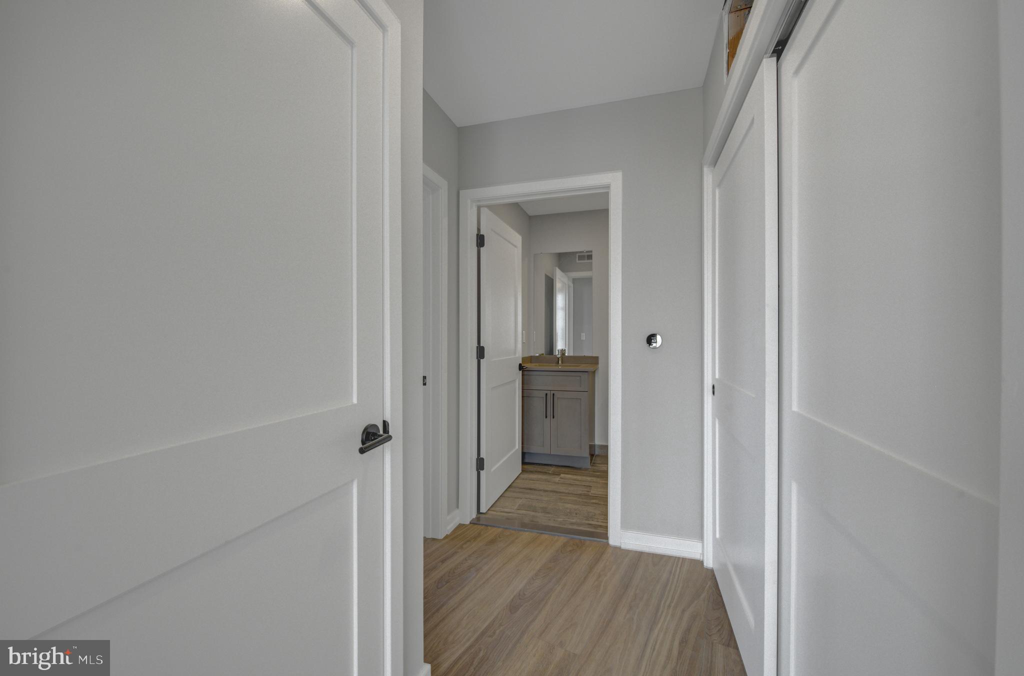 2445 Innovator Way, Unit 3A Philadelphia, PA 19146 - Photo 4 of 17 a view of a bathroom from a hallway