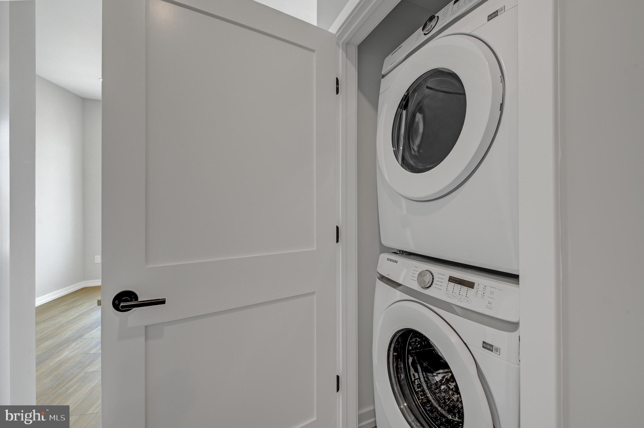 2445 Innovator Way, Unit 3A Philadelphia, PA 19146 - Photo 8 of 17 a utility room with dryer and washer