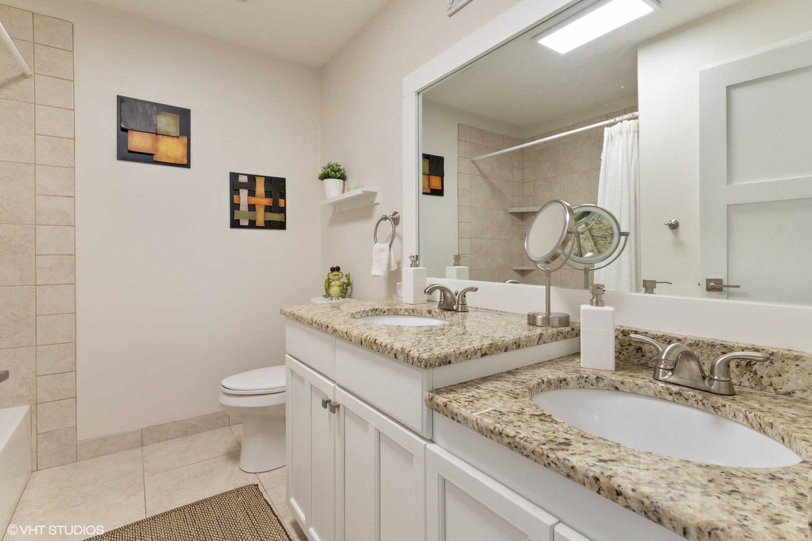 1430 Waukegan Road Deerfield, IL 60015 - Photo 13 of 20 a bathroom with a granite countertop sink and a mirror