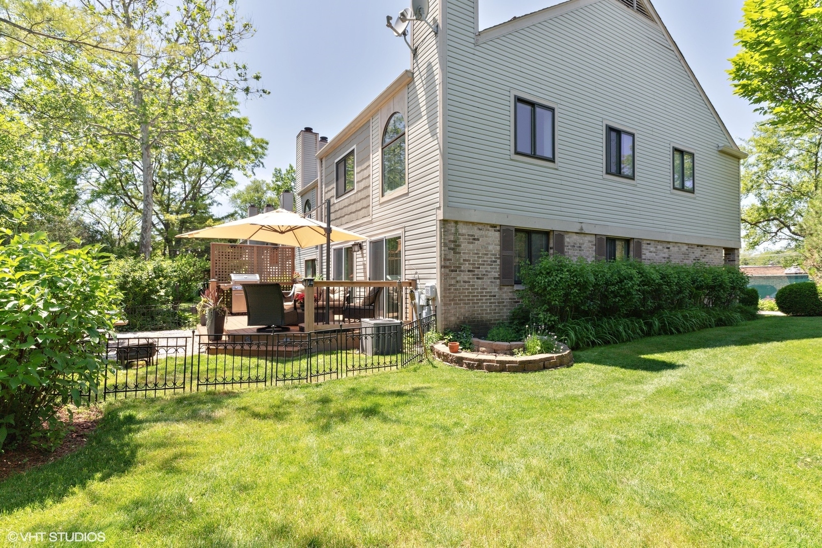 1430 Waukegan Road Deerfield, IL 60015 - Photo 20 of 20 a view of a house with backyard porch and sitting area