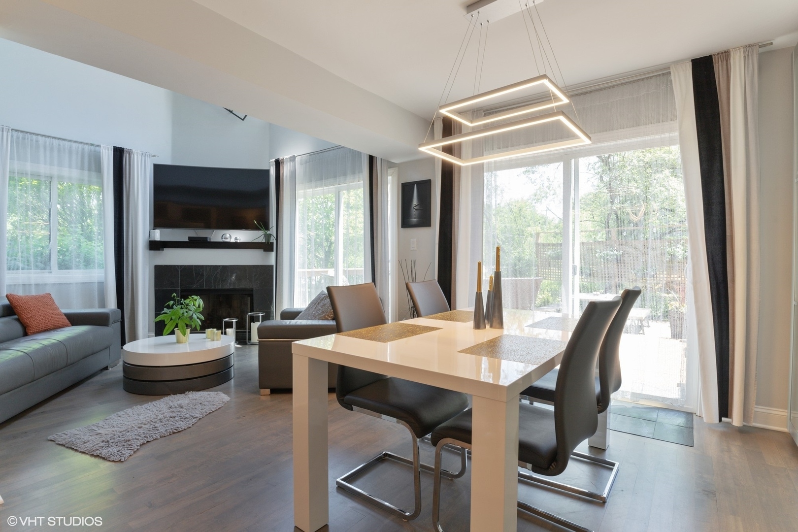 1430 Waukegan Road Deerfield, IL 60015 - Photo 7 of 20 a view of a dining room with furniture window and wooden floor