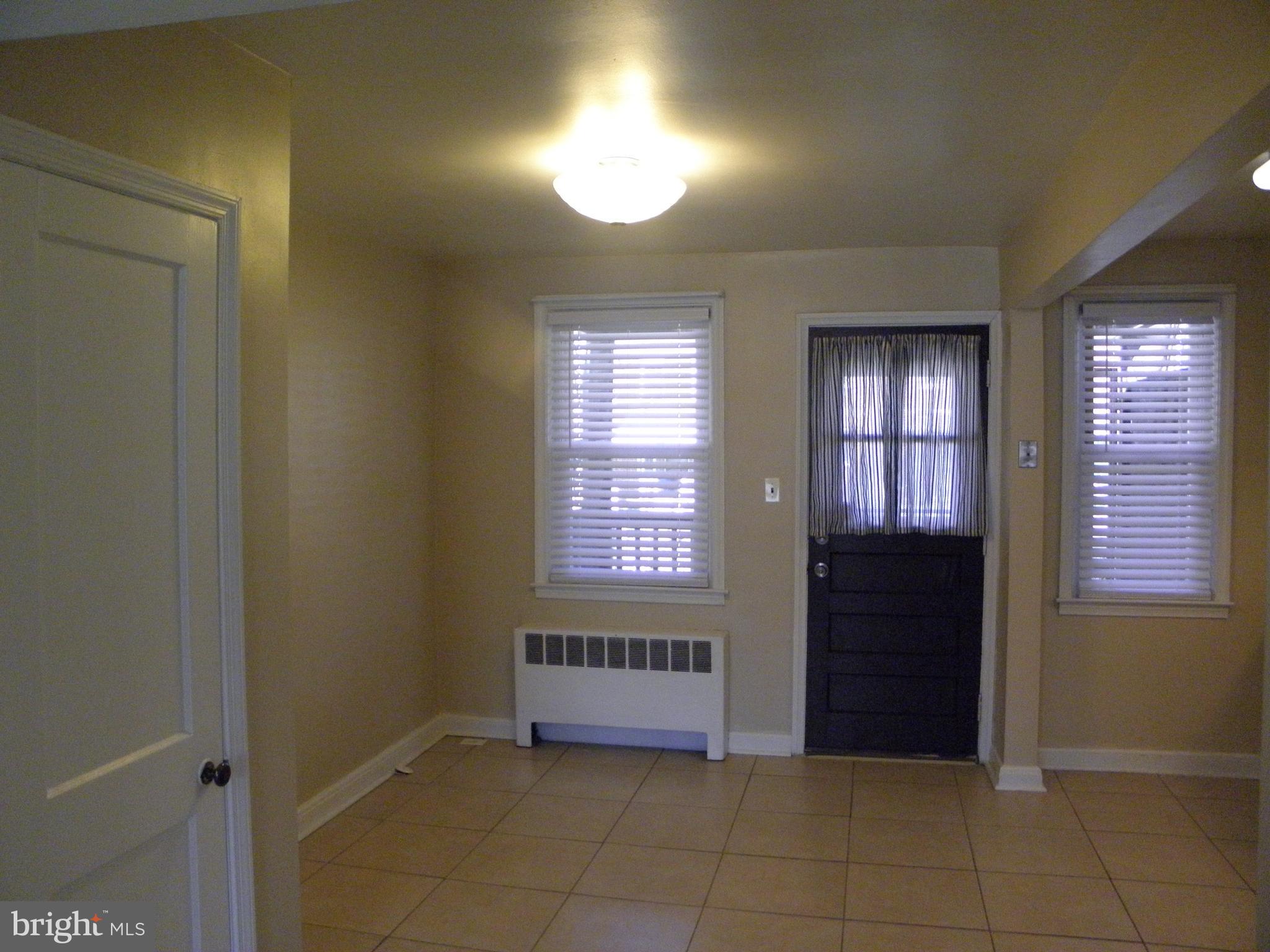 1214 Primrose Avenue Rosedale, MD 21237 - Photo 11 of 28 Dining area walk out to Porch