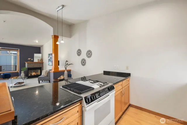 a kitchen with a stove and a sink