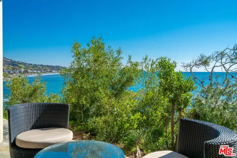 a blue outdoor space with sitting space