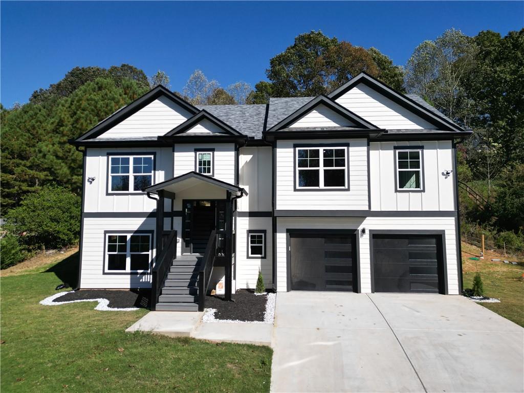 49 Sweetgum Street Talmo, GA 30575 - Photo 1 of 36 a front view of a house with a yard