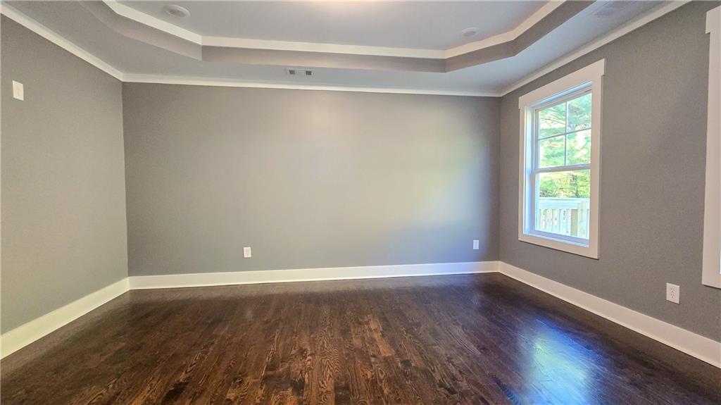 49 Sweetgum Street Talmo, GA 30575 - Photo 18 of 36 wooden floor in an empty room with a window