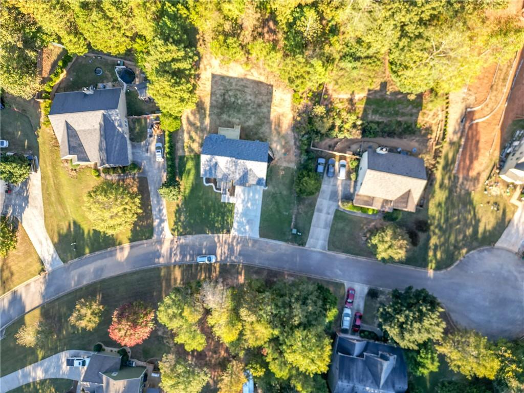 49 Sweetgum Street Talmo, GA 30575 - Photo 7 of 36 front view of a house with a swimming pool
