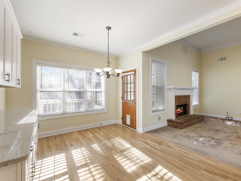 799 Gold Crest Road Braselton, GA 30517 - Photo 25 of 71 a view of an empty room with a window and fire place