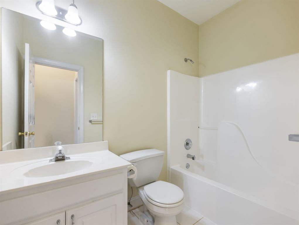 799 Gold Crest Road Braselton, GA 30517 - Photo 27 of 71 a bathroom with a sink a toilet and shower