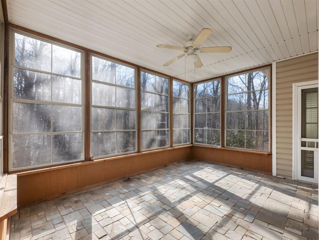 799 Gold Crest Road Braselton, GA 30517 - Photo 49 of 71 a view of empty room with wooden floor and fan