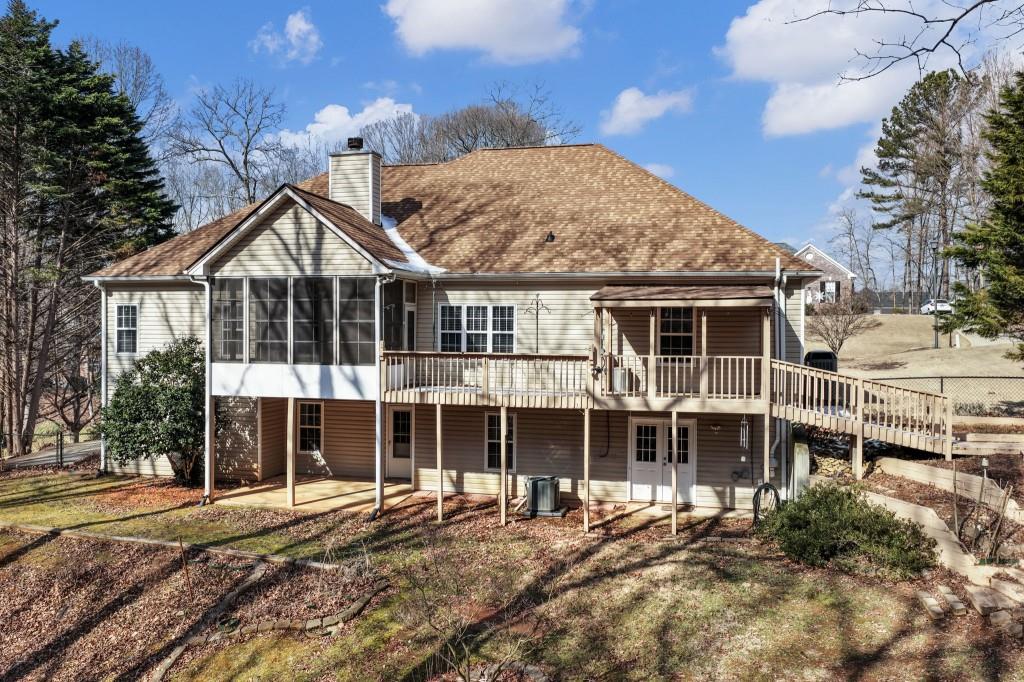 799 Gold Crest Road Braselton, GA 30517 - Photo 51 of 71 a front view of a house with a yard