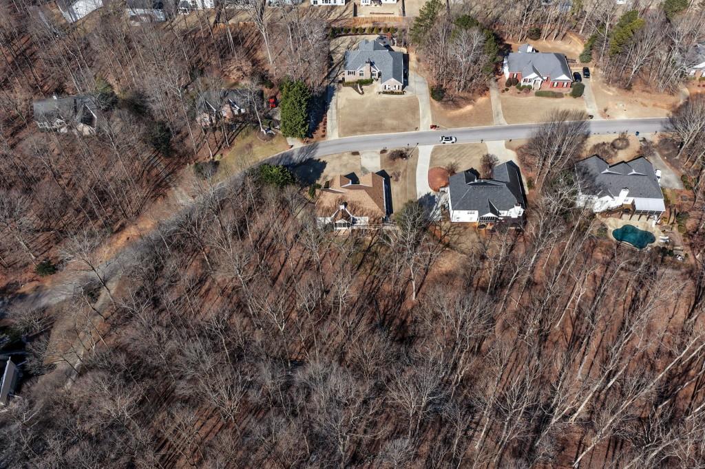 799 Gold Crest Road Braselton, GA 30517 - Photo 58 of 71 an aerial view of residential houses with outdoor space