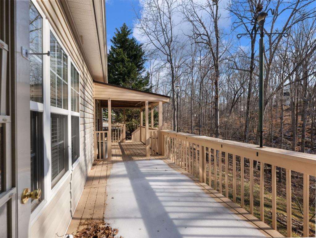 799 Gold Crest Road Braselton, GA 30517 - Photo 61 of 71 a view of a house with backyard sitting area