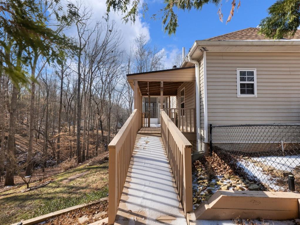 799 Gold Crest Road Braselton, GA 30517 - Photo 65 of 71 a front view of a house with a yard