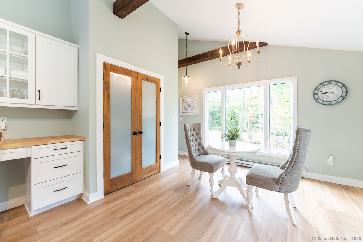 147 Pequot Avenue Groton, CT 06355 - Photo 16 of 39 a view of a dining room with furniture window and wooden floor