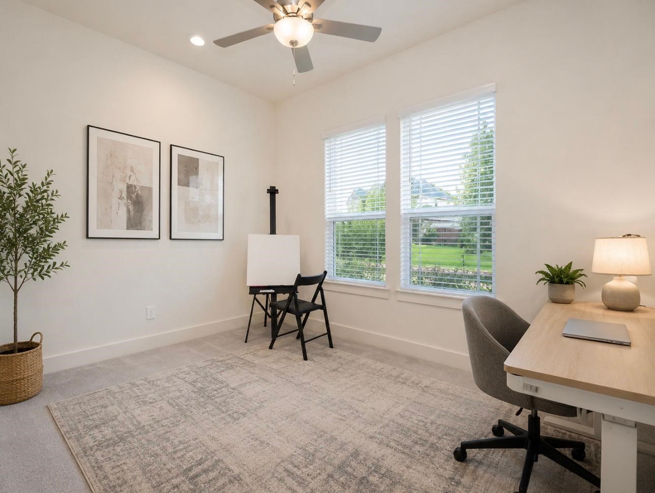 31915 Sky Rdg Lane Fulshear, TX 77441 - Photo 32 of 38 Bright and inviting secondary bedroom being used as a home office with large windows offering a garden view. Perfect for productivity and comfort.