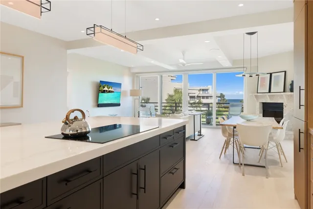 a kitchen with a sink cabinets and window