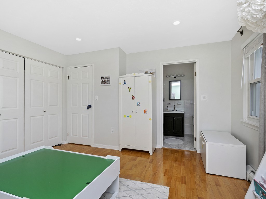2255 Commonwealth Avenue, Unit 2255 Newton, MA 02466 - Photo 19 of 32 a view of a room with window and wooden floor