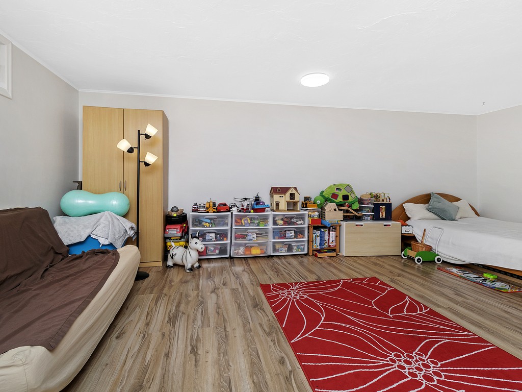 2255 Commonwealth Avenue, Unit 2255 Newton, MA 02466 - Photo 21 of 32 a living room with furniture and wooden floor