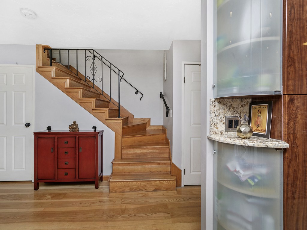2255 Commonwealth Avenue, Unit 2255 Newton, MA 02466 - Photo 10 of 32 a view of entryway and hall with wooden floor