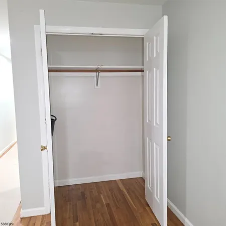 a view of a room with rack on the wall