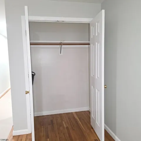 a view of a room with rack on the wall