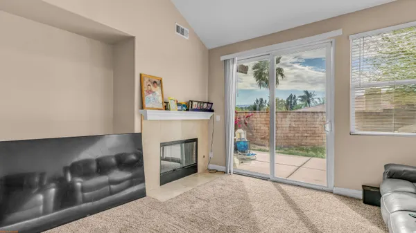 a bedroom with bed and a window