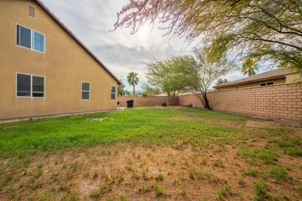 a view of a backyard with a garden