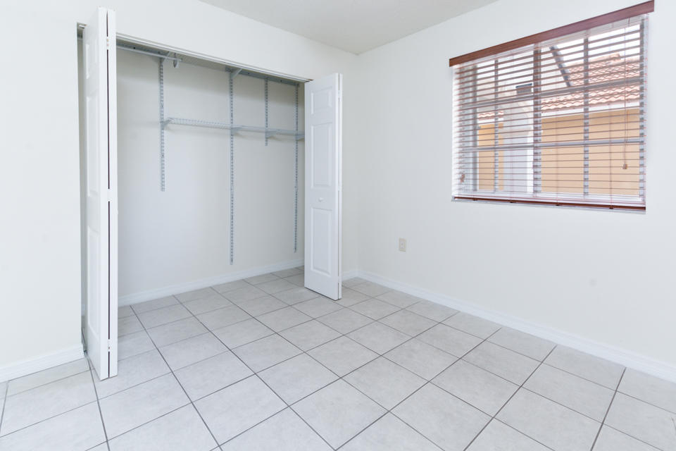 17841 Southwest 144th Avenue Miami, FL 33177 - Photo 6 of 19 an empty room with cabinet