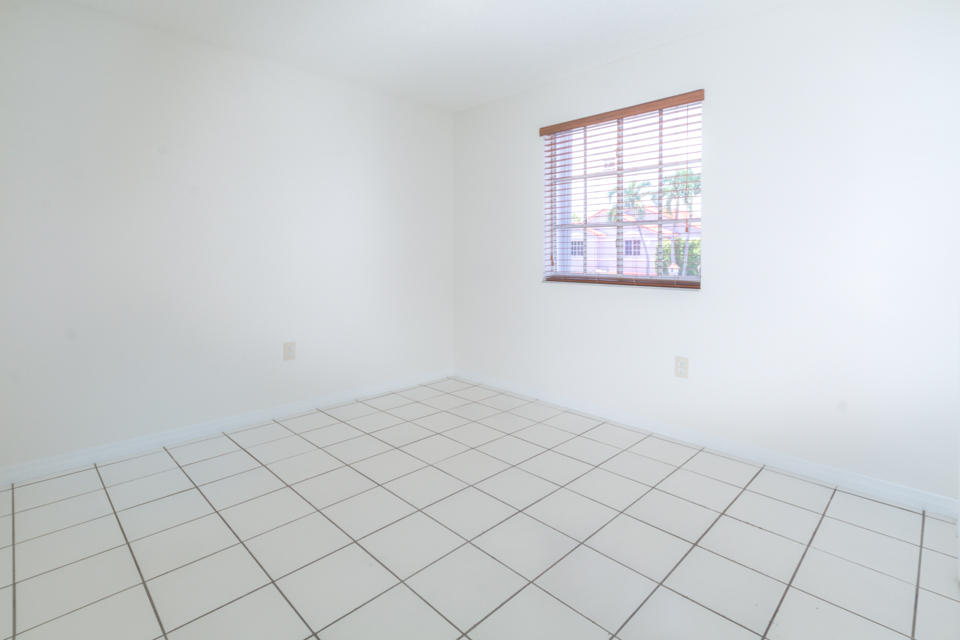 17841 Southwest 144th Avenue Miami, FL 33177 - Photo 8 of 19 an empty room with windows
