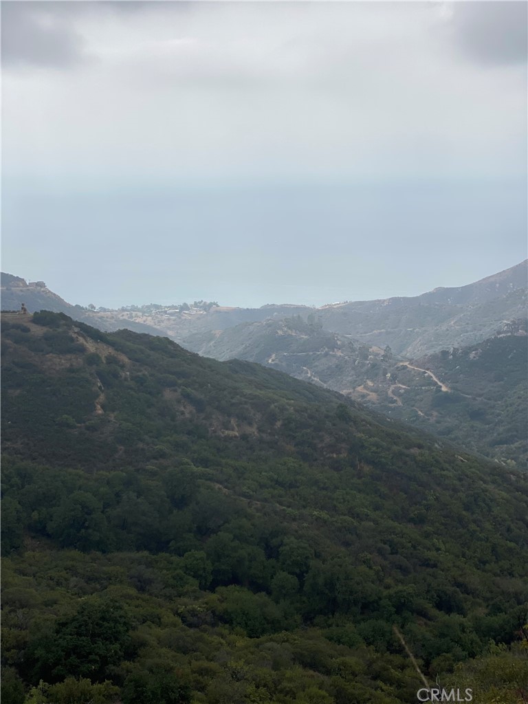 a view of mountain view with mountains in the background